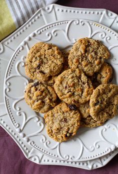 a white plate topped with cookies on top of a table