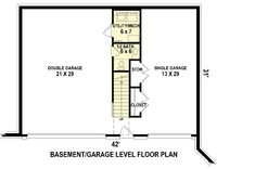 the basement level floor plan for a home with an attached garage and living room area