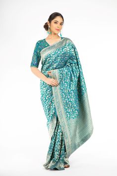 Marvelous Peacock Blue Handloom Banarasi Saree – Panache Haute Couture Festive Turquoise Pre-draped Saree, Blue Bollywood Banarasi Silk Pre-draped Saree, Blue Wedding Pre-draped Saree With Zari Weaving, Blue Jamawar Pre-draped Saree With Zari Weaving, Elegant Blue Banarasi Silk Pre-draped Saree, Blue Banarasi Silk Saree For Reception, Designer Blue Pre-draped Saree With Zari Weaving, Blue Pre-draped Saree With Zari Weaving For Designer Wear, Reception Jamawar Saree