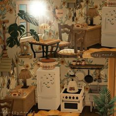 a kitchen filled with lots of different types of furniture and decor on top of a wooden floor