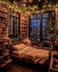 a bedroom with lots of bookshelves and plants