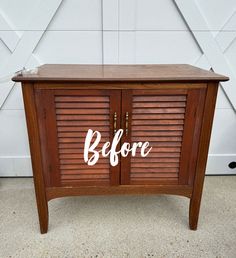 a wooden cabinet with the word before painted on it's door and shutters