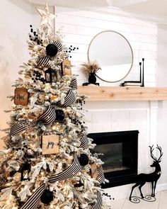 a decorated christmas tree with black and white ornaments