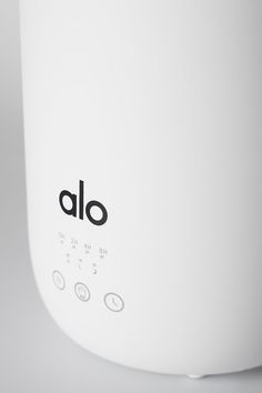 the word alo is written on the side of an electric cooker with buttons