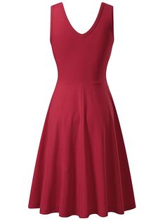 This knee length dress is a warm weather go-to. Made of a soft jersey material, it's stretchy and flattering, skimming over the body and flaring out into an a-line skater skirt. The fit and flare style is flattering a wide array of body types. The neckline is a flattering scoop neck, making it great for wearing on its own or for layering. Scoop neckline A-Line skater skirt Soft jersey material 65% cotton, 35% Polyester