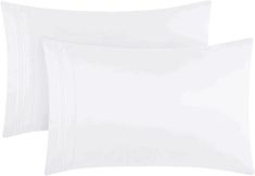 two white pillows on top of each other