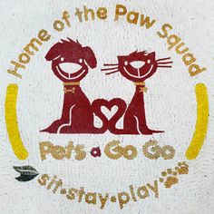 two cats sitting next to each other with the words home of the paw squad