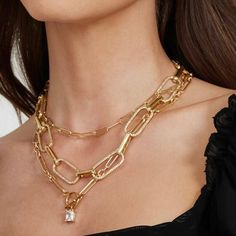 Indulge in versatile elegance with our Maeve Necklace. Crafted with a classic paperclip chain, this necklace is complete with an adjustable design, allowing you to customize the length to suit any outfit or neckline. Elevate your style effortlessly with the timeless charm and adaptability of the Maeve Necklace. Material: 14k Gold Filled Size: 17"L , adjustable Closure: Lobster Chic Metal Necklace With Paperclip Chain, Gold Paperclip Clavicle Chain Necklace, Chic Metal Paperclip Chain Necklace, Elegant Layered Necklace With Chunky Chain Links, Elegant Paperclip Chain Layered Necklace For Gift, Elegant Paperclip Chain Layered Necklace Gift, Elegant Layered Paperclip Chain Necklace As Gift, Paperclip Shaped Double Chain Jewelry As Gift, Elegant Paperclip Chain Necklaces