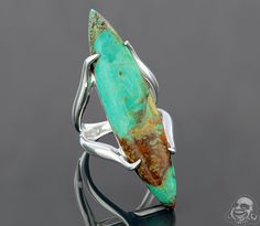 Sterling silver and turquoise ring (Size 7) Unique Untreated Turquoise Emerald Ring, Large Stone Turquoise Ring In Chrysocolla, Unique Turquoise Open Ring, Turquoise Chrysocolla Ring With Large Stone, Unique Open Turquoise Ring, Unique Turquoise Chrysocolla Ring, Turquoise Chrysoprase Ring, Ring Styles, Garden Spaces