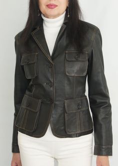 Ladies  black  leather short jacket , vintage, classic, button closure, four flap pockets , bust 34 in  materials-  genuine leather  lining 100% polyester excellent condition. pre owned. Please see photos for more detail  and feel Free to ask any Question by Ledermann the model is 176cm tall.  The actual measurements (laying flat ) bust (armpit to armpit ) 43 cm - 17 in waist  hem                         38 cm - 15 in shoulder to sleeve           62 cm- 24.5 in shoulder to shoulder       41 cm - 16 in collar to hem                       58 cm - 23 in  weight  0.66 kg - 1.46Lbs. Black Leather Short, Short Cuir, Black Leather Shorts, Leather Short, Leather Shorts, Jacket Vintage, Short Jacket, Flap Pocket, Halloween Shopping