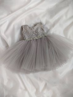 The trendy shade of pale gray will give your cute princess the look of elegance and beauty! P.S. Lace texture may slightly differ from the picture Grey Lace Dress, 1st Birthday Girl Dress, Gray Lace Dress, Girls Dresses Diy, Tulle Party Dress, First Birthday Dresses, Kids Dress Wear, Crystal Belt