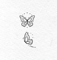 two butterflies on white paper, one with black ink and the other has small dots