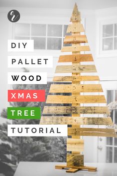 a wooden christmas tree made out of pallet wood with text overlay that reads diy pallet wood xmas tree