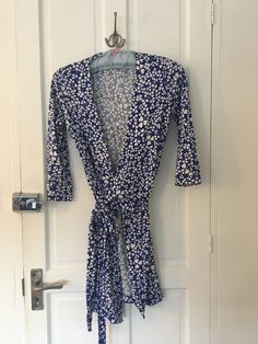 Vintage Diane Von Furstenberg blue and white pattern original wrap dress. 💯 silk size small Blue Wrap Dress With Tie Waist And Surplice Neckline, Blue V-neck Wrap Dress With Tie Waist, Blue Floral Print Wrap Dress, Blue Dress With Tie Waist And Surplice Neckline, Spring Blue Wrap Dress With Surplice Neckline, Spring Blue Wrap Dress With Tie Waist, Blue Tie Waist Wrap Dress For Spring, Blue Wrap Dress With Tie Waist For Spring, Blue Wrap Dress With Tie Waist