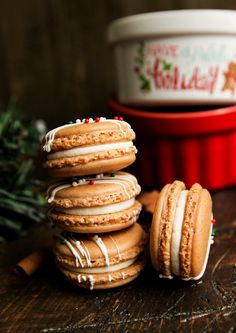 a stack of cookies sitting on top of a wooden table