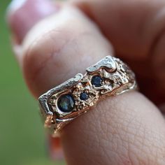 Process video of me making this ring is on my instagram @nadinesuzannejewellery This unique ring has been sand cast using 9ct yellow gold, sterling silver and sapphires art in place. This ring is such statement piece and reminds me of a face! Ring Size: US 9.5 - Can be made slightly larger please get in contact to discuss the size you want Metal: Sterling silver and 9ct yellow gold Gemstone: 3 x Parti sapphire Cast Rings, Parti Sapphire, Face Ring, Signet Rings, Sand Casting, Unique Ring, Mixed Metals, Signet Ring, A Face