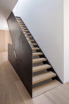 the stairs are made of metal and wood