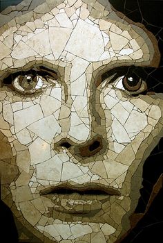 the face of a woman made out of mosaic tiles