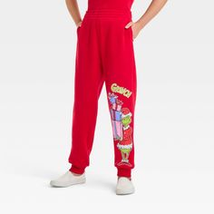 For fun-filled days, your child will love wearing The Grinch Dreamy Fleece Athletic Bottoms. Made from cotton-polyester blend fleece fabric with spandex, these mid-rise jogger pants bring all-day comfort to their day. Designed with ribbed ankles for a neat finish, these slim-fit jogger pants feature two side pockets for stashing small everyday essentials. These red jogger pants feature a graphic showing the Grinch holding a stack of gift boxes in his hands for a fan-favorite look. Red Joggers, Slim Fit Joggers, Girls Fleece, The Grinch, Flare Leggings, Kids Outfits Girls, Hem Style, Bottom Clothes, Cozy Knits