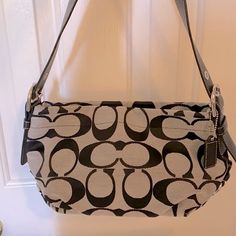 Coach Purse (Nwot) Black And Grey Signature Bag With Shoulder Strap. Please Reach Out With Any Questions. This Bag Is New And Never Been Used. Closet Clean Out Time! Chic Gray Shoulder Bag With Silver-tone Hardware, Casual Coach Shoulder Bag With Silver-tone Hardware, Coach Gray Shoulder Bag With Silver-tone Hardware, Coach Gray Shoulder Bag, Chic Coach Gray Shoulder Bag, Chic Gray Coach Shoulder Bag, Coach Gray Bag With Silver-tone Hardware, Coach Gray Rectangular Shoulder Bag, Coach Bags With Silver-tone Hardware In Gray