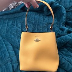 Only Used This Purse Once. Comes With Crossbody Strap As Well. In Excellent Condition. Coach Mollie Bucket Bag, Coach Mollie, Mustard Yellow Color, Crossbody Strap, Mustard Yellow, Yellow Color, Coach Bags, Bucket Bag, Mustard