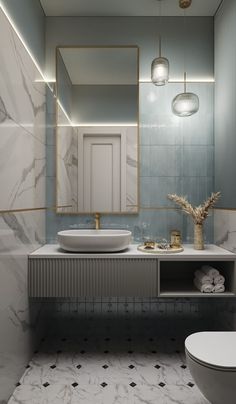 a bathroom with two sinks and a mirror above the sink in front of a toilet