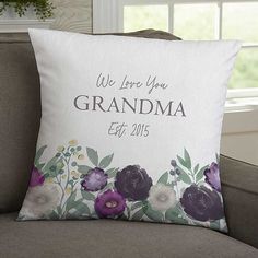 a pillow that says i love you mommy with purple flowers on the front and back