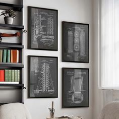 three framed photographs hang on the wall next to a chair and bookshelf in a living room