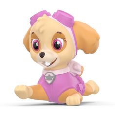 a small toy dog with big eyes and a pink outfit on it's chest