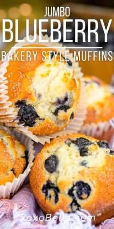 three blueberry muffins sitting on top of each other with the title jumbo blueberry bakery style muffins