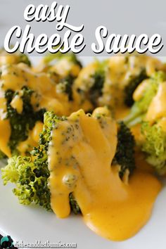 broccoli covered in cheese sauce on a white plate with the words easy cheese sauce