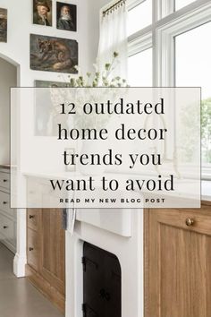 a white kitchen with wood cabinets and pictures on the wall above it that says, 12 outdated home decor trends you want to avoid