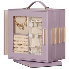 a purple jewelry box with many different items in it