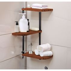 two wooden shelves holding soap and lotion in a bathroom