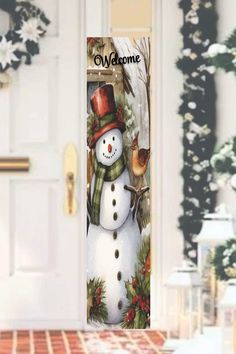 the door is decorated with a snowman and birds