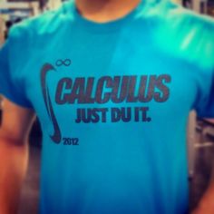 a close up of a person wearing a blue t - shirt with the word calcius just out on it