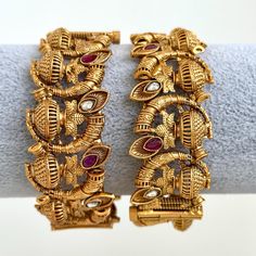 Ruby Gold Rajwadi Kundan openable Kada Bangle(1Pc)Single Kada/Indian Kada/Wedding Jewelry/Kada/Punjabi Jewelry/Indian Wedding Made from High-Quality Hand Picked Kundan Stone Sold as a single kada  Perfect Kundan bangles for Party Wear. The Look Is Stunning And Preciously Suitable For All Kinds Of Dressy Occasions Its a Ideal Gift for Your Loved ones, Wife, Mother, Sister, Friend, Excellent gift for Birthday, Anniversary, Wedding , Can be wear any party , wedding, Festivals and Celebrations etc. This is 100% Handmade jewelry. So Color, shades, texture displayed may slightly vary from the actual product due to digital image limitations. We request you to consider these minor variations. Please expect the possibility of some slight imperfections when buying hand made jewelry. If you have any Elegant Festive Bangle With Zari Work, Elegant Zari Work Bangle For Festive Occasions, Festive Navratri Sets With Intricate Design, Festive Sets With Intricate Design For Navratri, Heavy Traditional Saree For Wedding, Bollywood Style Bangle For Diwali Wedding, Bollywood Bangle For Wedding And Diwali, Gold Tilla Sets For Transitional Season, Traditional Gold Sets With Peacock Design