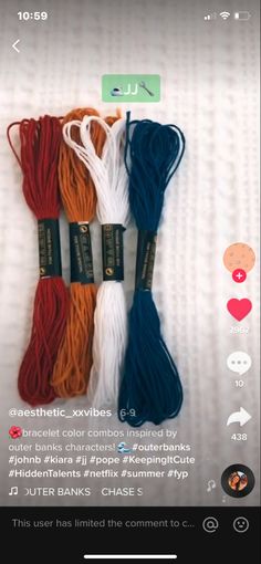 four skeins of different colors and sizes on a white sheet with an instagramr