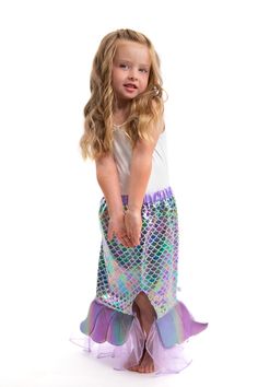 Your little one will be ready to plunge into the sea and make waves during playtime in their new Mermaid splash skirt! Elastic waist wrapped in purple china silk stretch to fit a variety of sizes China silk skirt with scales printed in shimmering purples and oceanic colors Heat seal fin that arcs in the middle for more movement during play with organza underskirt Breathable, Silky Soft, 100% Polyester Fabrics Accessories Sold Separately Playful Mermaid Swimwear For Summer, Purple Mermaid Dress For Summer, Summer Purple Mermaid Dress With Mermaid Hem, Playful Purple Bottoms For Playtime, Playful Purple Swimwear, Purple Summer Mermaid Dress, Summer Purple Mermaid Dress, Purple Sleeveless Mermaid Dress For Summer, Baby Heartbeat