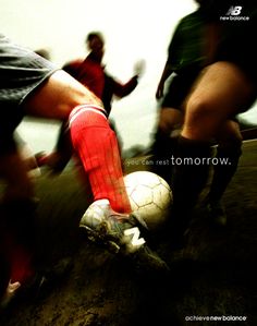 two soccer players are kicking the ball in front of each other with words above them