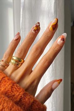 Here are some cute and easy nail designs you can do for this thanksgiving season! This is also perfect for just the fall and winter season. Check out nailcompany.com for a variety of affordable nail supplies! 💛 Similar colors are tagged! #acrylic #shortnails #gelpolish #nailsupplies #kiarasky #dnd #naildesign #nailideas #winternails #fallnails #almondshape #trendy #thanksgivingnails #brown #yellow Autumn Orange Nails, Turkey Nails, Nails And Rings, Thanksgiving Nail Designs, Nails Orange, Simple Fall Nails, November Nails, Nail Art Inspo, Thanksgiving Nails