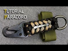 the paracord is being used as a keychain to hold something in place