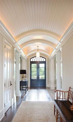 the hallway is clean and ready for us to use as an entrance way in this home