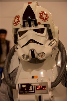 a star wars helmet is on display in a museum