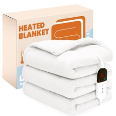 the heated blanket is stacked on top of each other next to an electronic temperature controller