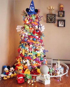 a mickey mouse christmas tree in a living room