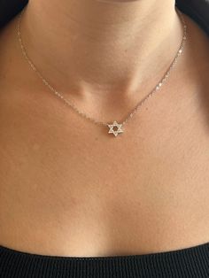 Tiny silver 925 Star of david necklace. small sterling silver women necklace . star of david necklace. Judaica Jewelry.  necklace. kabala . This  Magen David (star of David) is perfect for women small  size  pendant. Necklace info: Sterling Silver 925 . with rhodium plated on it ,to keep it not to tern black. stones set: CZ Length is 41cm+5cm extender. pendant size is 10mm (0.40") The necklace packaged and shipped in a beautiful gift box. David Star, Star Of David Necklace, Judaica Jewelry, Necklace Packaging, Necklace Star, Black Stones, Women Necklace, Name Bracelet, Star Of David