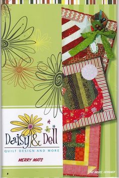 the front cover of daisy and dell quilt design and more by merry arts, featuring flowers