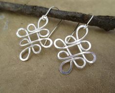 Looping Celtic Crossed Knots Sterling Silver by nicholasandfelice Silver Wire Earrings, Celtic Knot Earrings, Wire Jewelery, Wire Work Jewelry, Knot Earrings, Work Jewelry, Celtic Jewelry, Diy Schmuck, Bijoux Diy