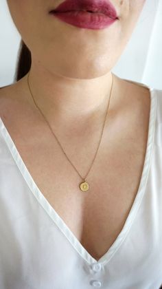 12mm 14K Delicate Sun and Moon Necklace, Layering Solid Gold Necklace, Dainty sun and moon necklace, Gold Disc Necklace, Minimalist necklace, 9K gold sun and moon necklace, FREE EXPRESS SHIPPING Beautiful and delicate necklace with a disc charm engraved with a crescent moon and sun rays, made in 14K or 9K solid gold. She's Like the Sun and the Moon Because even on the cloudiest of days... And darkest of nights... She still find the way to shine bright! Whisper...Shine Bright! ------------------- Minimalist Everyday Jewelry With Sun And Moon Design, Everyday Yellow Gold Sun And Moon Necklace, Everyday Necklace With Sun And Moon Round Pendant, Everyday Necklaces With Sun And Moon Round Pendant, Dainty Sun And Moon Design Charm Necklaces For Everyday, Everyday Round Charm Necklace With Moon Phase, Everyday Dainty Sun And Moon Charm Necklaces, Everyday Sun And Moon Design Round Pendant Necklaces, Dainty Sun And Moon Design Charm Necklaces